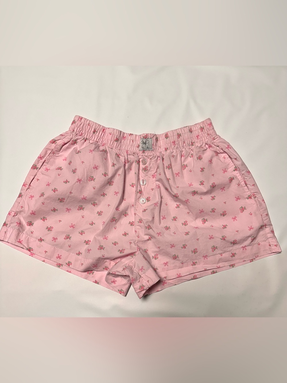 Women's Pink Floral Athletic Shorts with Button Front